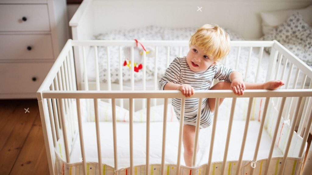 how to keep toddler from climbing out of crib 4