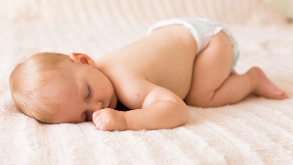 why do babies sleep with their butt in the air 4