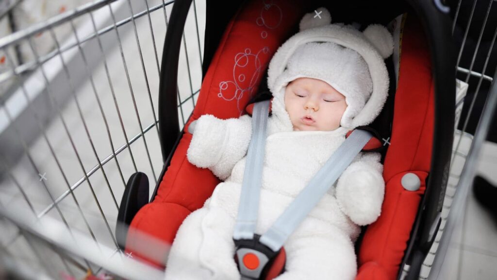 How to put a car seat on a shopping cart 5